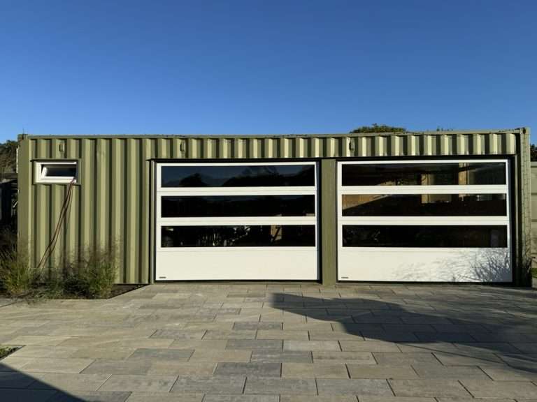 40ft shipping container converted into a garage with roll-up doors
