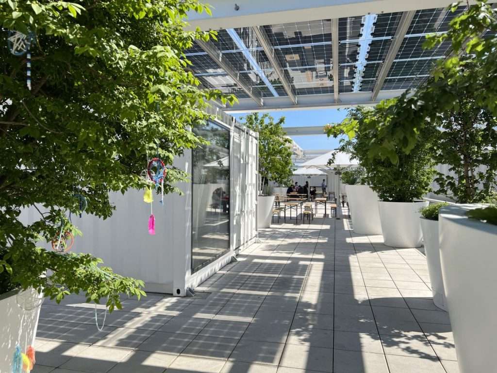 Rooftop hospitality area built from shipping containers