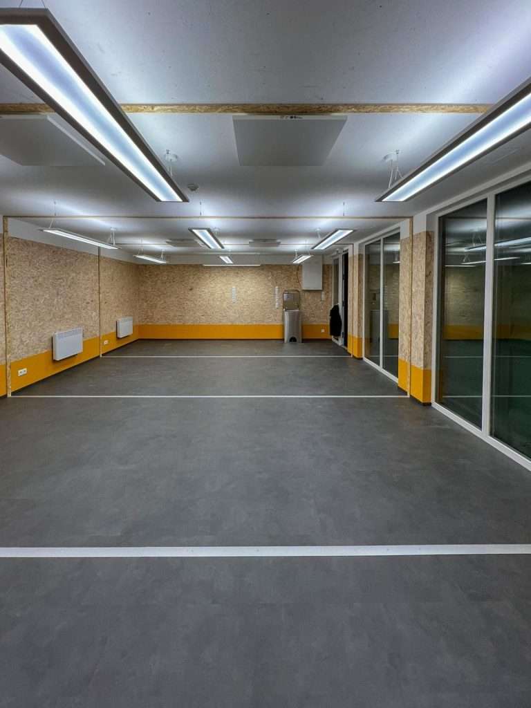 Open-plan classroom built from four 20ft shipping containers